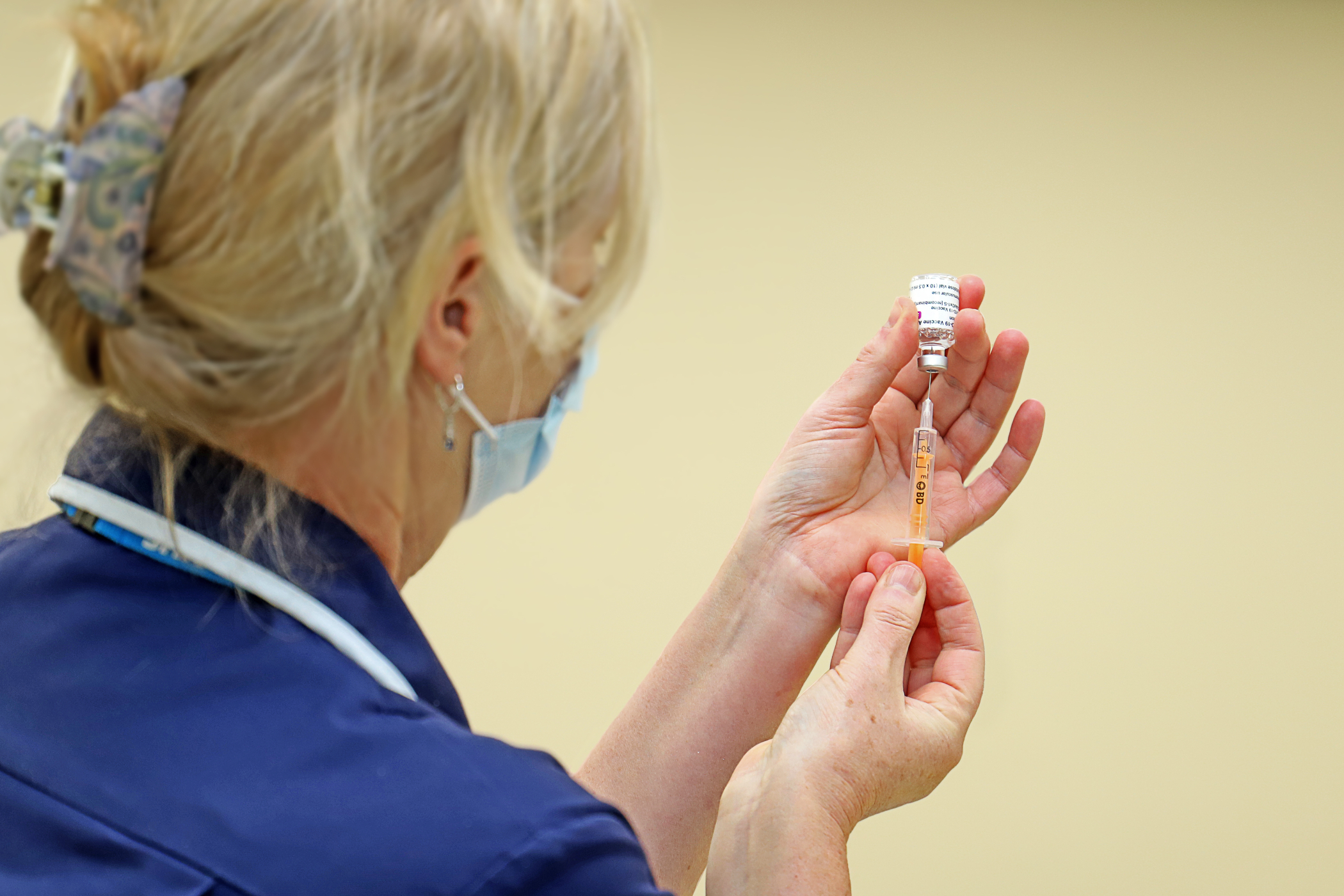 Nurse holding needle
